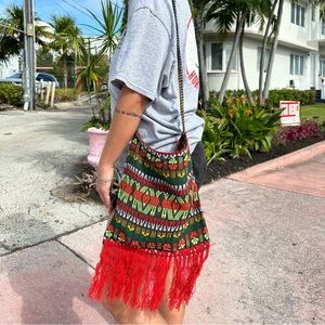Festival chic! Looks cute w a white tee, and very unique!